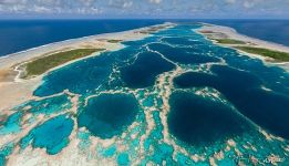 Central pools of the lagoon, divided by razor-sharp coral barriers