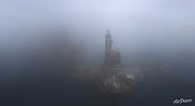 Lighthouse in the fog