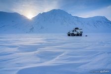 All terrain vehicle on the frozen river #3